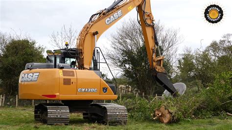 mini excavator with hydraulic chainsaw|hydraulic chainsaw.